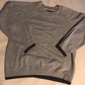 Gray sweatshirt with black trim. Size L.